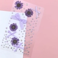 Purple dried flowers with ribbon bows and iridescent rhinestones on clear film - Purple Dried Flower Bows (BJA-661)