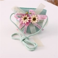 Detail of mint green straw bag with pink silk flowers and heart-shaped shoulder strap - Mesh Flower Style / Aqua Green