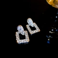 Sparkling silver square drop earrings with white rhinestones and a luxury geometric design - Silver
