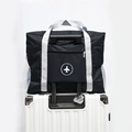 Bolsa de viaje plegable negra con logo de avión montada en el asa de la maleta - Bolsa de avión de segunda generación (45x17x35cm) / Negro