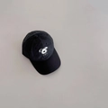 Detail view of cartoon dog embroidery and 'DOG' text on black quick-dry baseball cap - 52-54cm 3-6 Years / Black