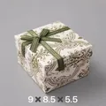 Detail of square beige gift box with green floral patterns and Best Wishes ribbon bow - 9x8.5x5.5/Vintage White With Bowknot