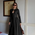 Elegant black long sleeve dress with neckline cutout and pleated skirt for women - XS / Black