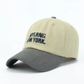 Two-tone khaki and grey baseball cap featuring navy NEW YORK embroidery design - Ivory