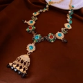 Detailed macro view of vintage gold necklace with colorful gems and pearl tassels - 34# Gold Necklace Colorful Tassel
