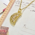 Close-up of gold-plated watermelon slice pendant with clear zircon on vintage letter - White-Style 2