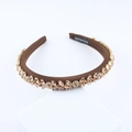 Close-up of handmade baroque headband with pink and champagne crystal flower patterns - Dark Coffee