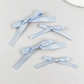 Set of four light blue satin ribbon bow hair clips in two sizes on a grey surface - Blue (4pcs Set)