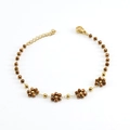 Bracciale in acciaio inossidabile dorato con fiori di cristallo marrone e moschettone - Bracciale / Bronzo