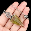 Tree of Life pendulum with green crystal chips, resin cone, and copper spiral coil - Peridot Crystal