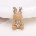 Close-up of a light brown rabbit shoe charm with sparkling rhinestone embellishments - Khaki Rabbit