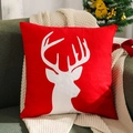 Red Christmas cushion cover with white reindeer pattern on cozy beige knit blanket - Red Offset White Reindeer/Red
