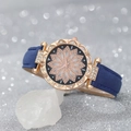 Detailed macro view of a rose gold women's watch with crystal-encrusted floral dial - Watch Only / Blue