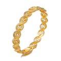 Detail of gold floral hollow bangle with twisted rope design and intricate polished metal finish - Style 5