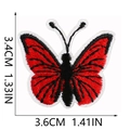 Macro shot of embroidered butterfly patch with red, black and white threads showing texture - Red Black White Butterfly (C19HD-052-24)