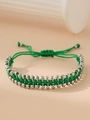 Detail of adjustable green braided rope bracelet with polished silver stainless steel beads - Green