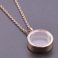 Rose gold round stainless steel locket necklace with clear glass window on grey surface - Inner Diameter 15mm / Rose Gold
