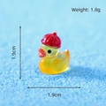 Miniature yellow luminous duckling resin ornament with red hat 1.9cm height size - Cool Duck - Red Hat