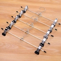 Set of four silver metal hangers with adjustable non-slip clips for pants and skirts - Small Soft Bead / Black