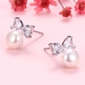 Orecchini eleganti con fiocco e perla naturale, con zirconi in finitura argento - Perno in Argento S925 / Perla Bianca / Perla Bianca