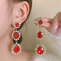 Close-up of luxury red gemstone earrings with gold tassels and sparkling rhinestones - 925 Silver Needle Gold Style (3#)