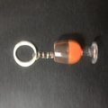 Creative resin red wine glass keychain featuring orange liquid charm on metal ring - Orange