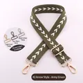 Detailed view of adjustable army green bag strap with white arrow jacquard and metal clips - Army Green