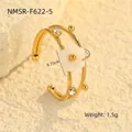 Detail of 18K gold flower ring with white shell petal and crystal accents on stone - One Size (Adjustable Open) / Double Layer Flower with Zirconia