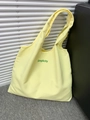 Simple light yellow canvas tote bag with green Simplicity print for travel and shopping - Yellow