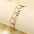 Detail of gold double-layer anklet featuring butterfly charms and colorful teardrop beads - Colorful Beads Butterfly Double Layer Style (KJ4183-SXSJ)