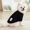 Classic black cable-knit pet sweater with Happy Bear patch on a small white Pomeranian - Black Wool Sweatshirt