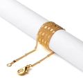 Detailed view of a gold chain necklace with flat decorative sequins and a lobster clasp - 62cm / Gold Flattened Chain