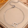 Silver stainless steel bracelet featuring a delicate hollow clover pendant and adjustable chain - Steel Hollow Clover Charm
