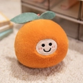 Süßes Orangen-Plüschtier mit besticktem Smiley-Gesicht und grünem Blattdetail - 12cm Anhänger / Orange