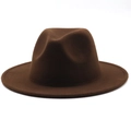 Detail view of the high-quality dark brown wool felt texture on this wide brim fedora hat - Coffee