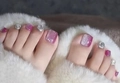 Pink and silver gradient press-on toenails with square rhinestones on soft white fur - FW26