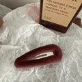 Detail of burgundy velvet teardrop hair clip with soft texture on white tissue paper - Water Drop / Dust Rose
