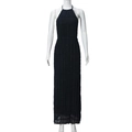 Detailed view of black tiered pleated fabric on a backless halter maxi dress for women - XS / Black