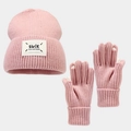 Detail of pink knitted beanie and gloves set with letter label and reinforced white fingertips - Pink