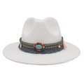 Detailed view of bohemian white wide-brim cowboy hat with turquoise beads and colorful tassels - White