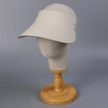 Detail of beige open top sun hat with wide curved brim on a mannequin head stand - M (56-58cm) / Beige