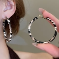 Detail view of large C-shaped hoop earrings featuring black and white leopard print fabric - 10# Hoop - Beige Brown - 5mm