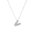 Macro shot of silver zircon pavé V-letter pendant necklace with hip hop aesthetic style - Letter V