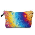 Close-up of vibrant tie-dye makeup bag with fluid art patterns and black zipper closure - Psychedelic Fluid Yellow Blue Orange