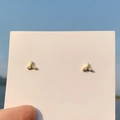 Golden whale tail stud earrings with small diamonds on pink card under natural light - 925 Silver Needle / Gold Fishtail Stud Earrings