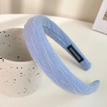 Light blue padded sponge headband with pleated fabric texture and handmade label - Sky Blue Pleated Sponge Headband