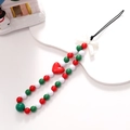 Detail der Weihnachts-Handykette mit roter Herzperle und weißer Schleife als Anhänger - K1433 Herz Schleife Handy-Kette