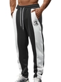 Men's jogger pants in black and white patchwork design with drawstring waist - S / Bottoms / Black + Statue of Liberty Print