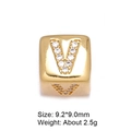 Macro detail of 8mm gold plated letter V charm with cubic zirconia for DIY jewelry - Letter V