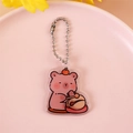 Pink Capybara acrylic keychain with orange fruit detail and pink bead chain - Pink Capybara with Fruit on Head